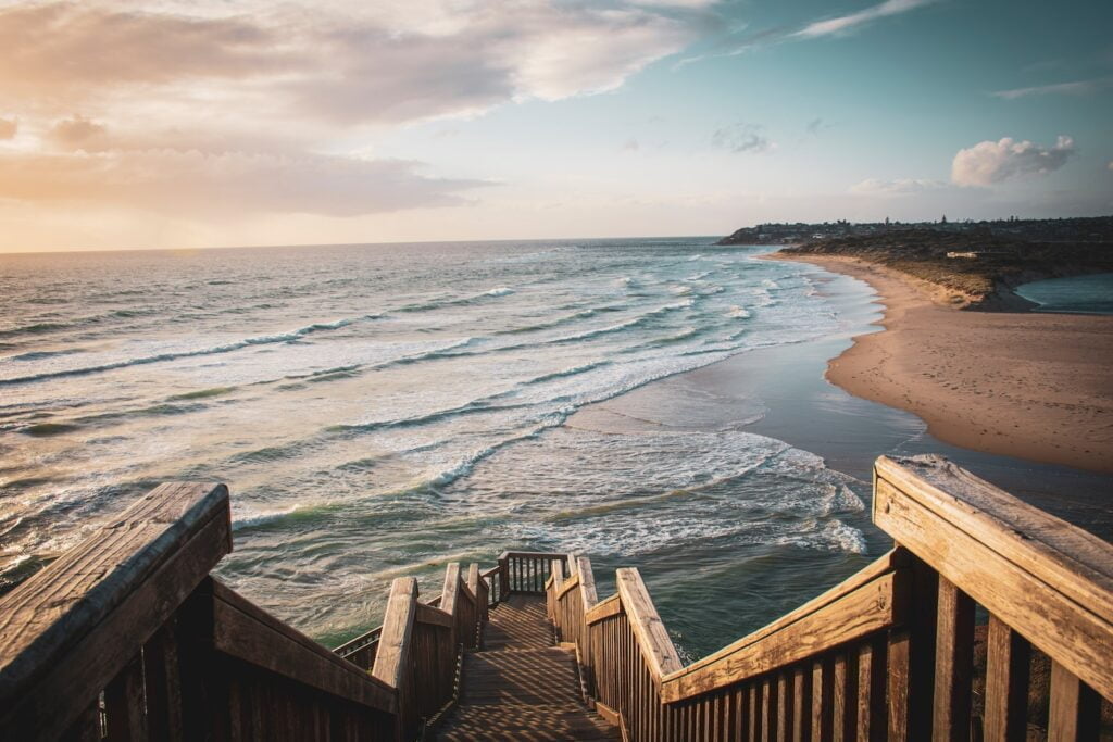 Brown wooden dock on sea during daytime