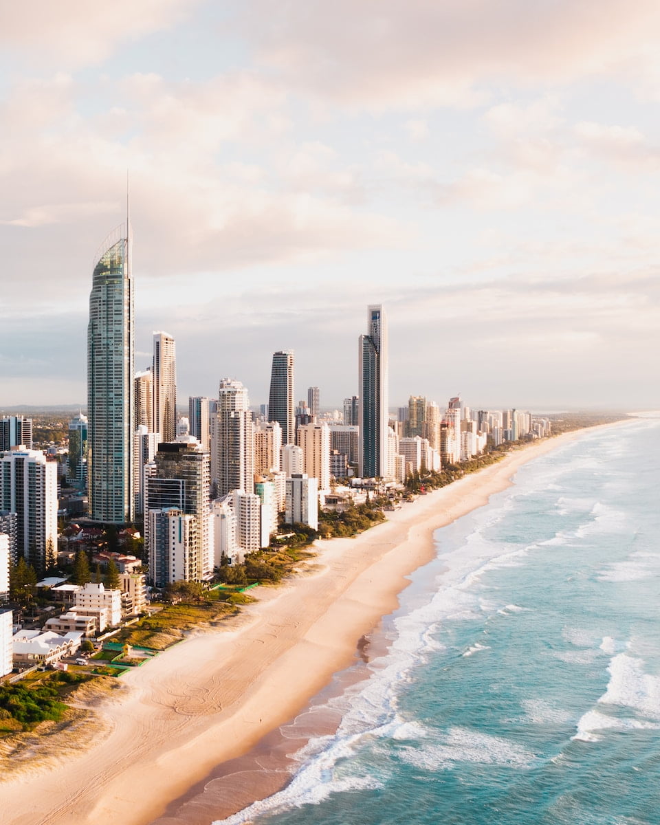 an aerial view of a queensland near a beach - gold coast backpackers - east coast backpackers - east coast australia - backpacking the east coast - east coast of australia