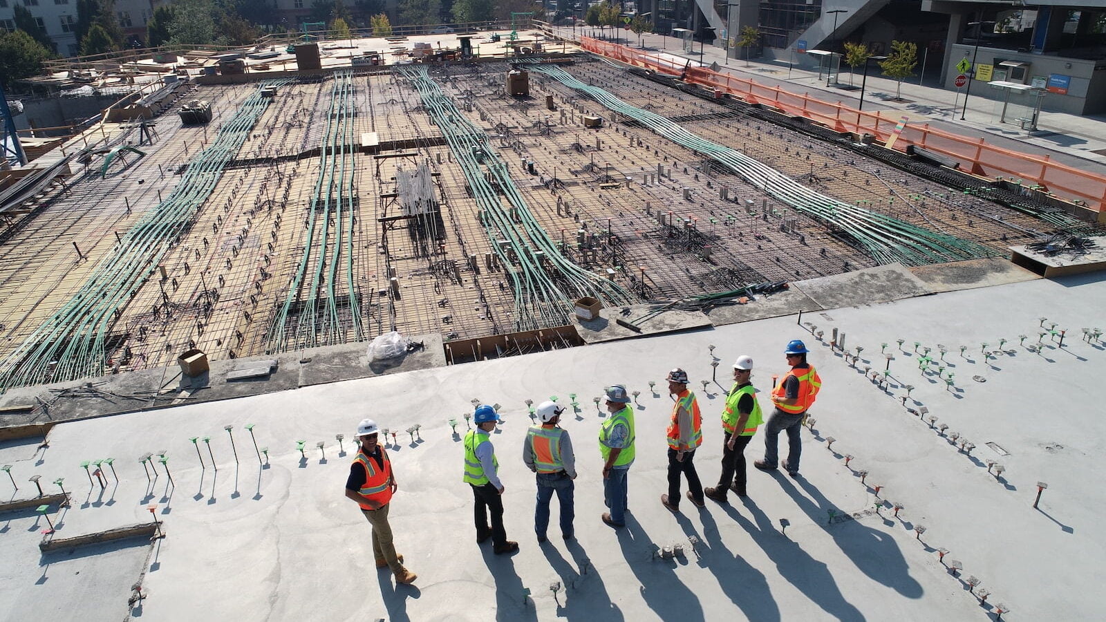 How to find backpacker jobs in australia 4 Construction workers looking at job - working holiday visa job - backpacker job