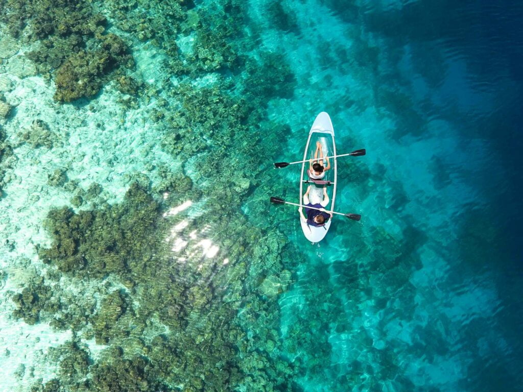 Our 6 epic backpacker camping & hiking trips you won't regret 5 Two backpackers Riding Kayak at the great barrier reef