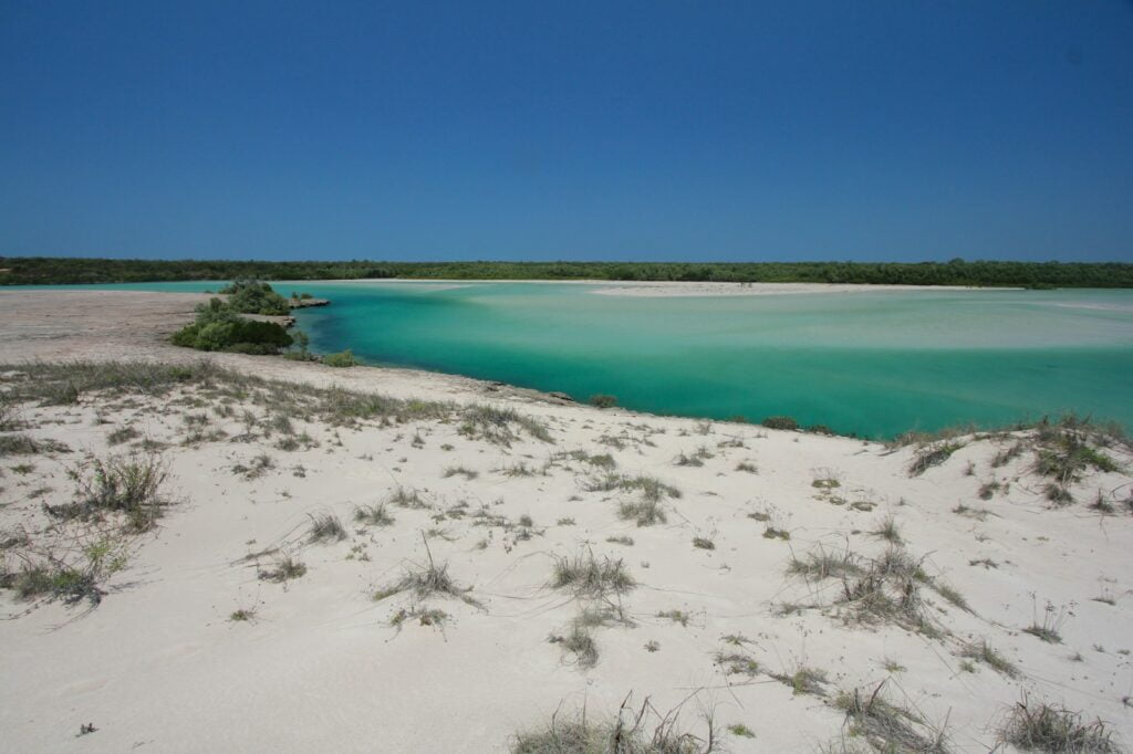 Our 6 epic backpacker camping & hiking trips you won't regret 4 backpacker enjoying kimberley australia white sand near body of water during daytime