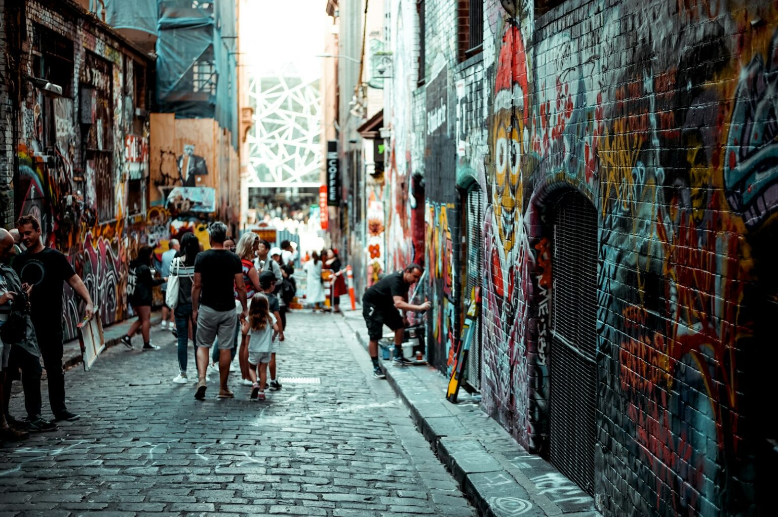 melbourne art galleries, museums and street art man and girl walking beside building